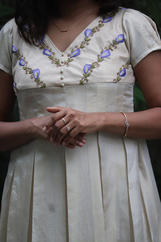 Shankupushpam - Floral embroidered box pleated dress
