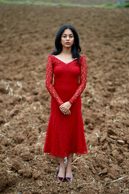 Scarlet mermaid-cut red lace dress with body-flattering silhouette - front view