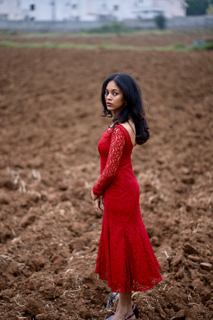 Scarlet mermaid dress close-up of intricate red lace pattern