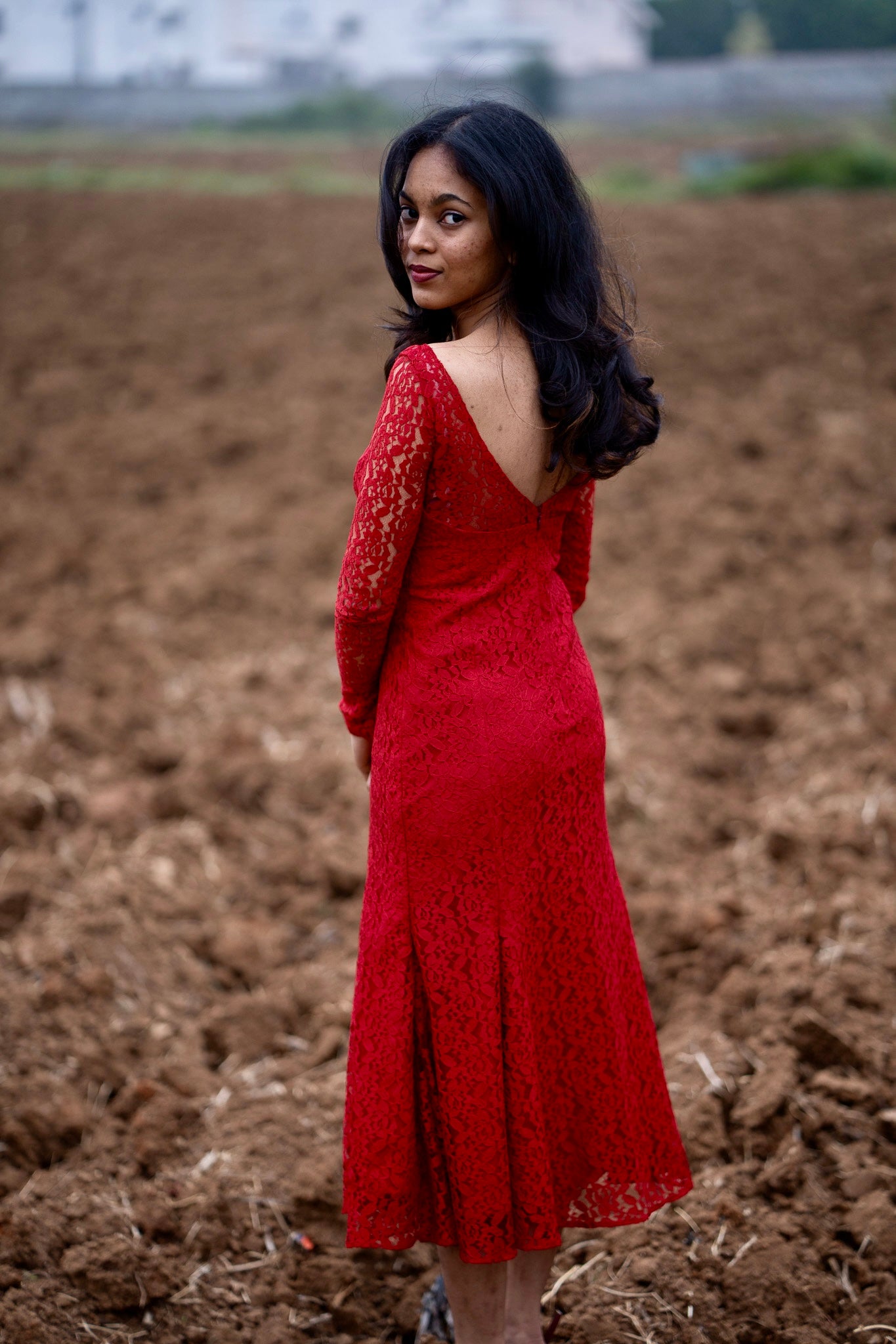 Scarlet red lace dress back view with mermaid-cut silhouette
