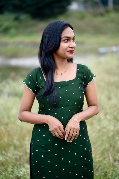 Esmera emerald green top and pant set with golden embroidered buttas - close-up view