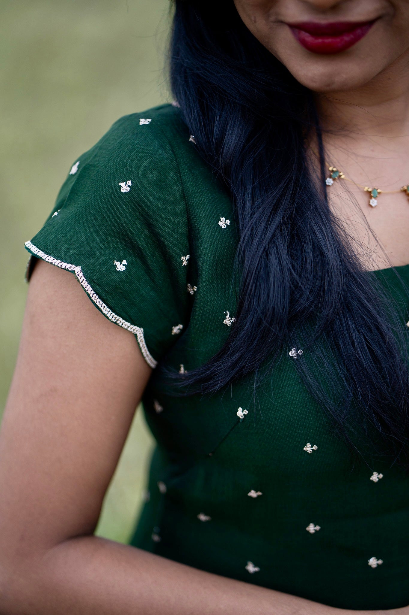 Esmera emerald green top and pant set with golden embroidered buttas - close-up detail view