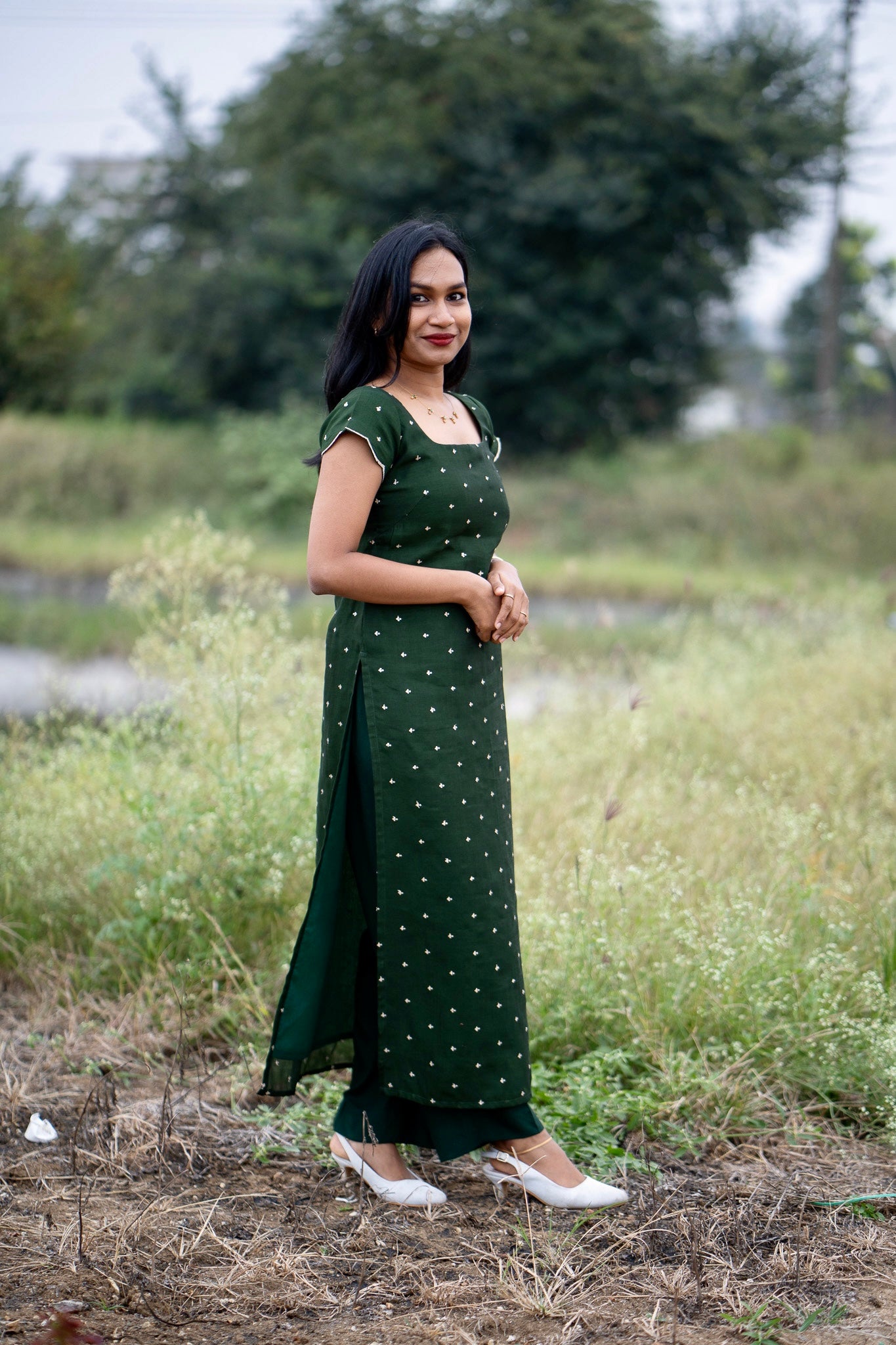 Esmera emerald green top and pant set with golden embroidered buttas - side view