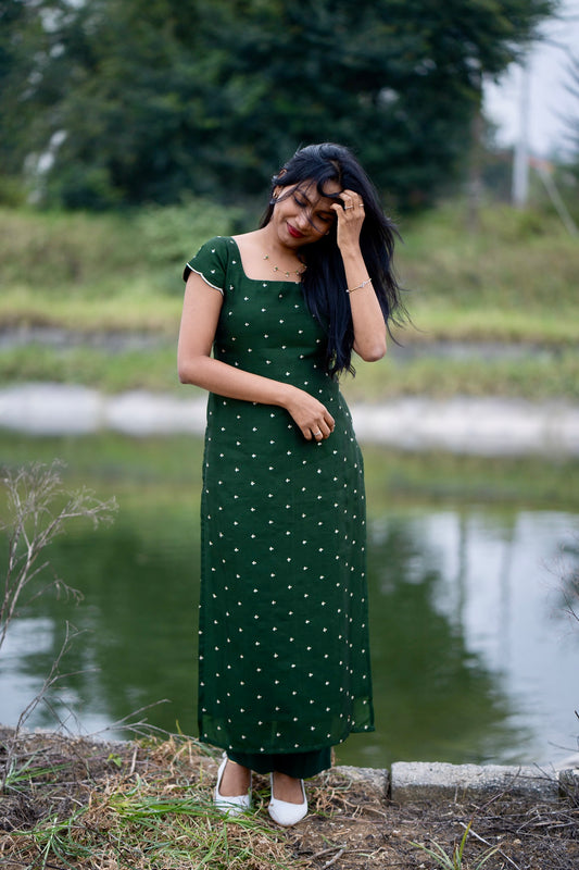 Esmera emerald green top and pant set with golden embroidered buttas - front view