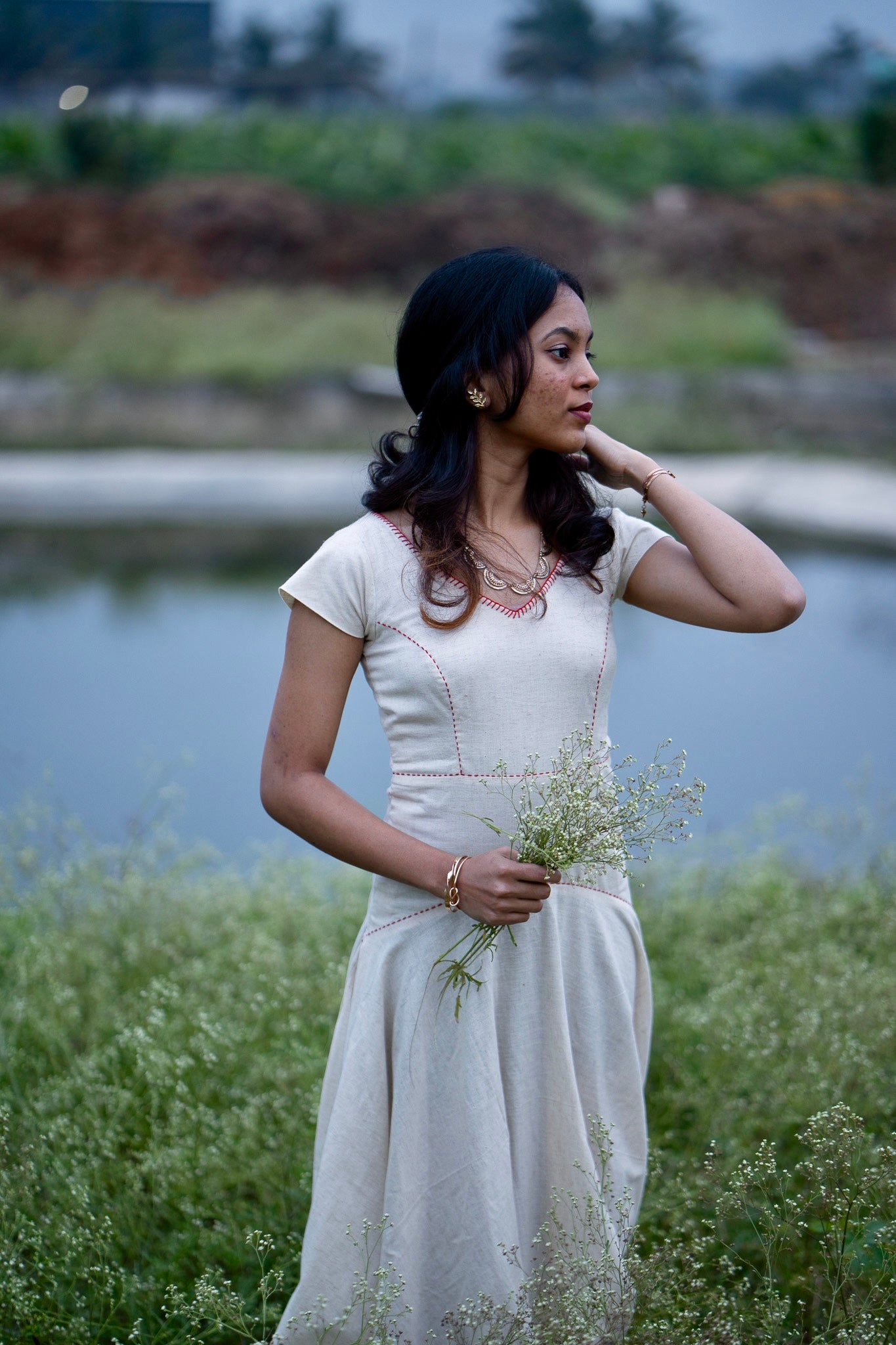 Taara ivory umbrella flared dress with red katha stitch detailing - front view