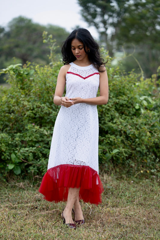 Roselle white and red aline dress with red net gathers at the hem with flower lace work - front view