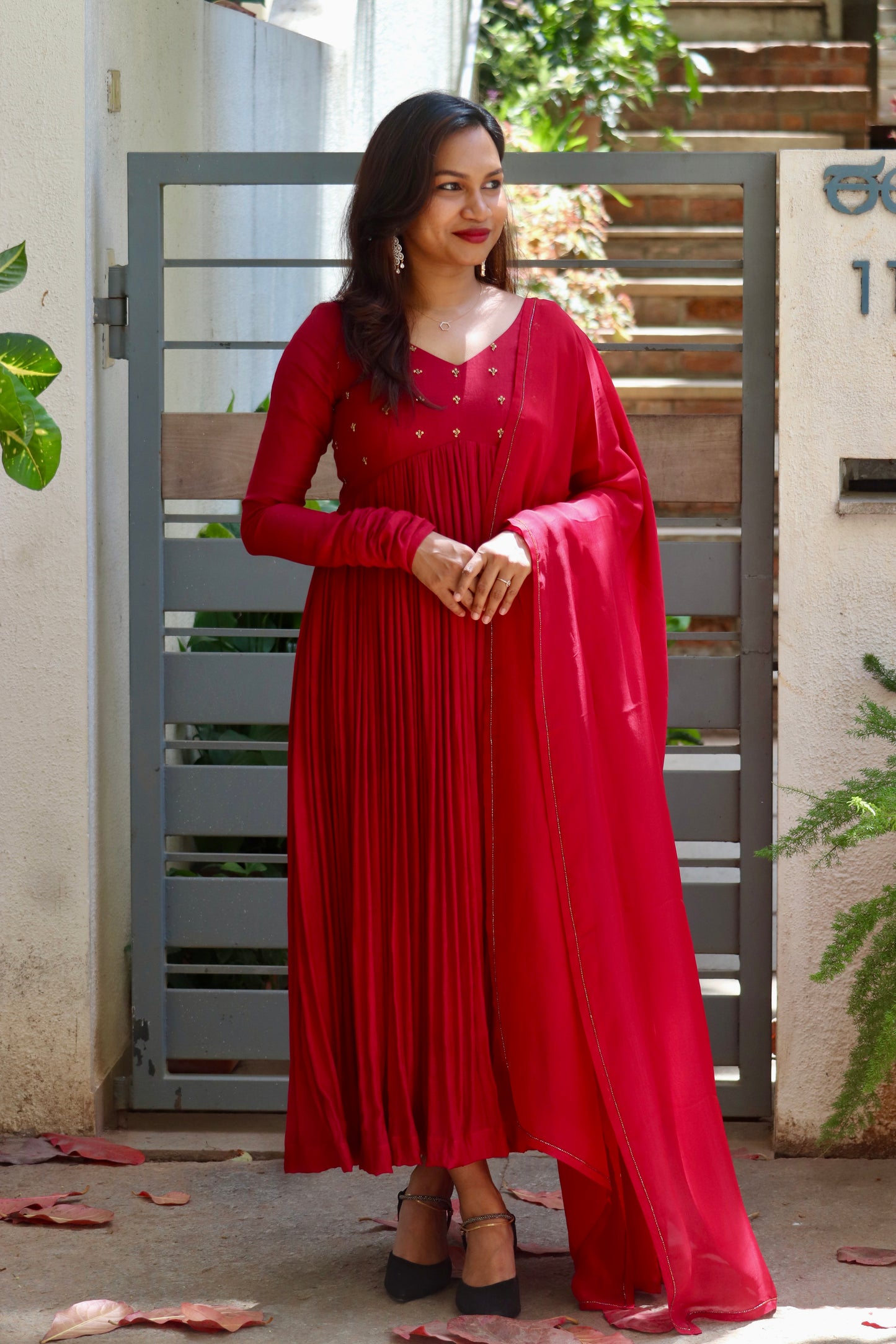 Raahiya maroon anarkali showing pleated flare and full sleeves