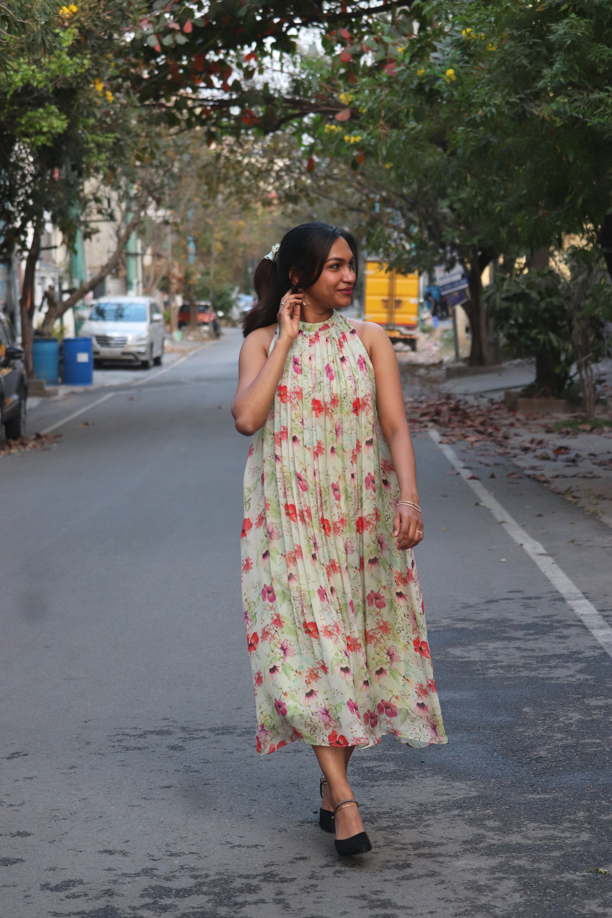 Jaselle pastel mint with vibrant floral prints pleated halter neck flared dress - front view