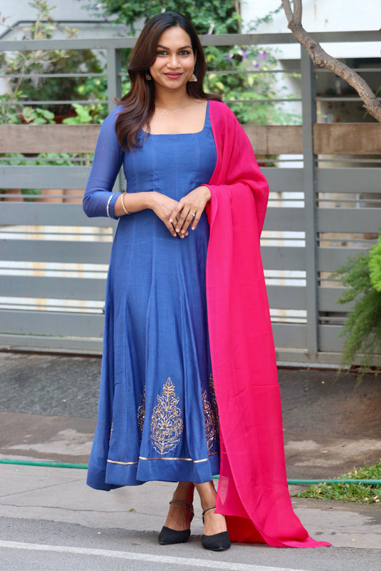 Neelika anarkali showing 12 panel flared silhouette and square round neckline