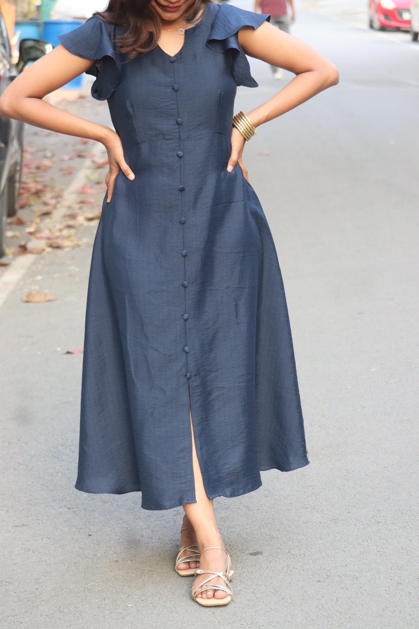 Velina fit-and-flare midi dress showing button detail and front slit