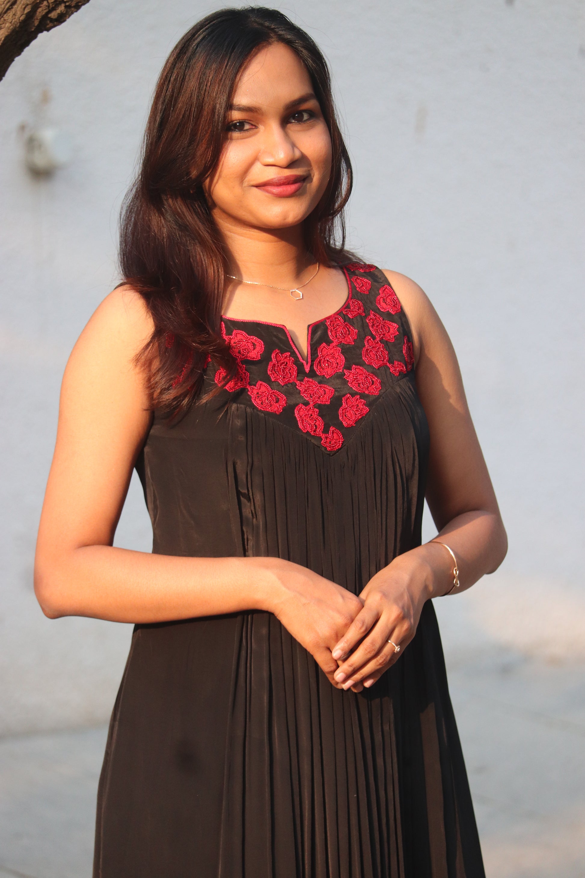 Noorika black and red kurti back view showing sleeveless design