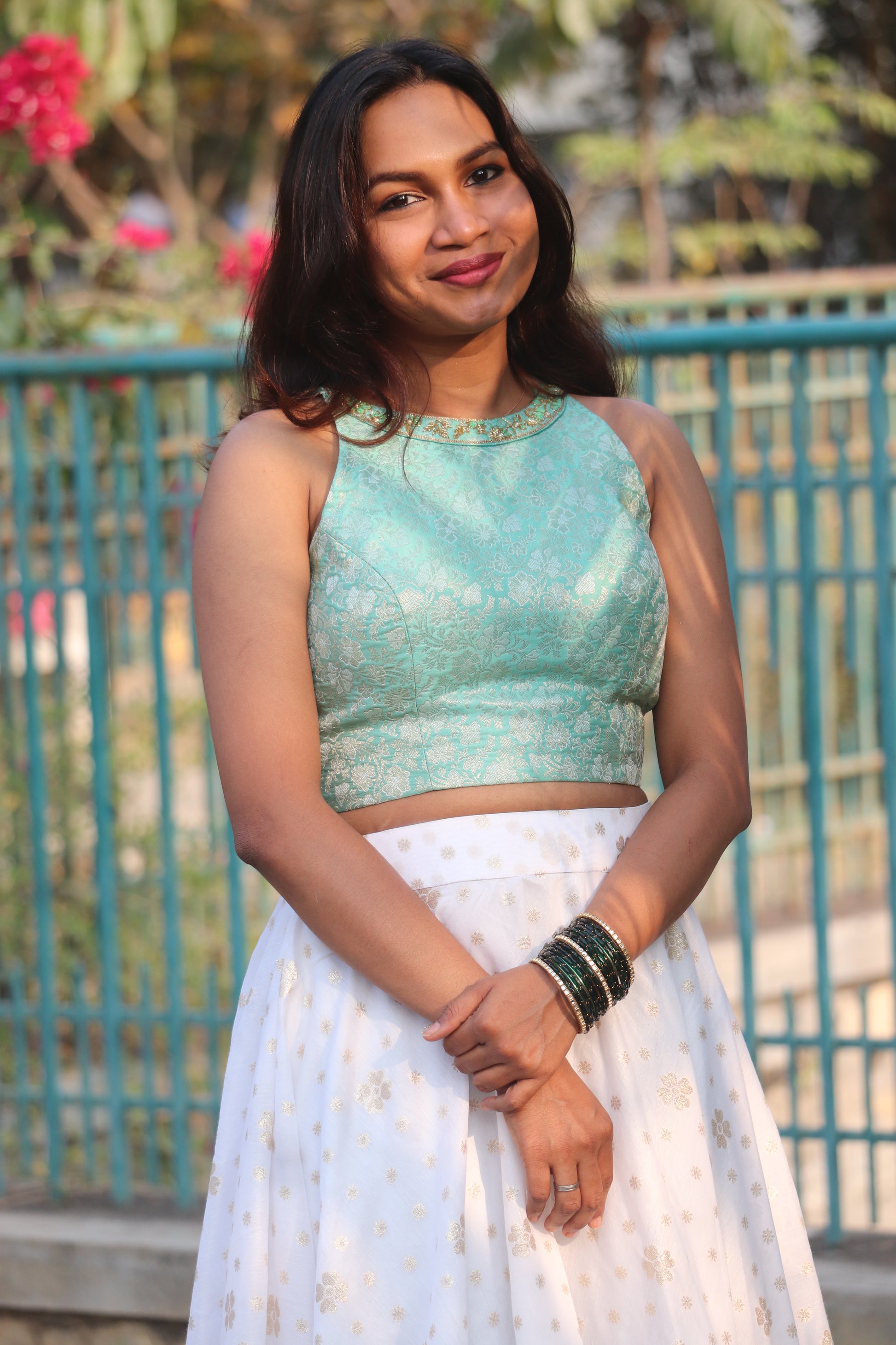 Nila skirt and top set back view showing sleeveless blouse and skirt flow