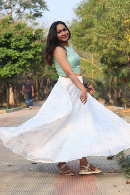 Nila skirt and top set showing brocade blouse with floral jacquard weaving and halter neckline