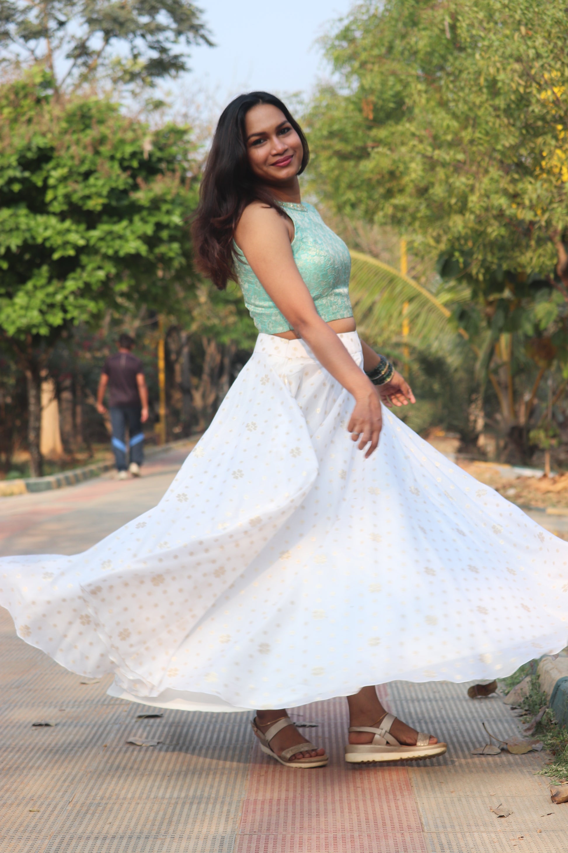 Nila skirt and top set showing brocade blouse with floral jacquard weaving and halter neckline