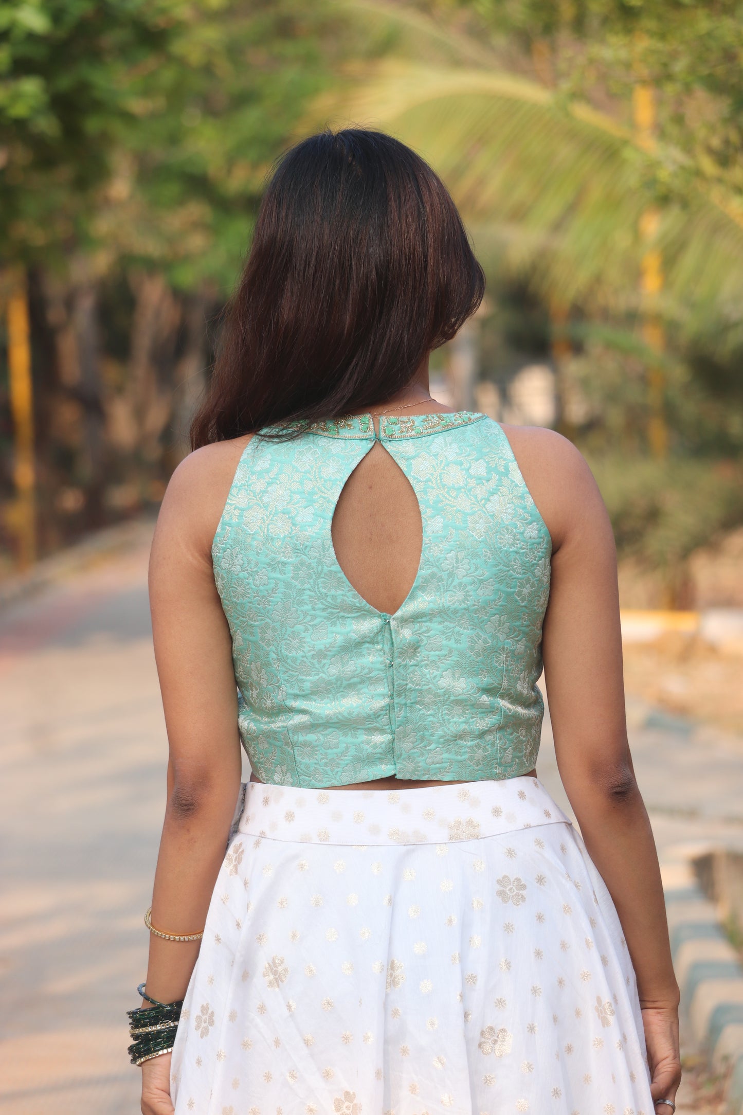 Nila aqua green set side view with ivory Chanderi umbrella skirt drape