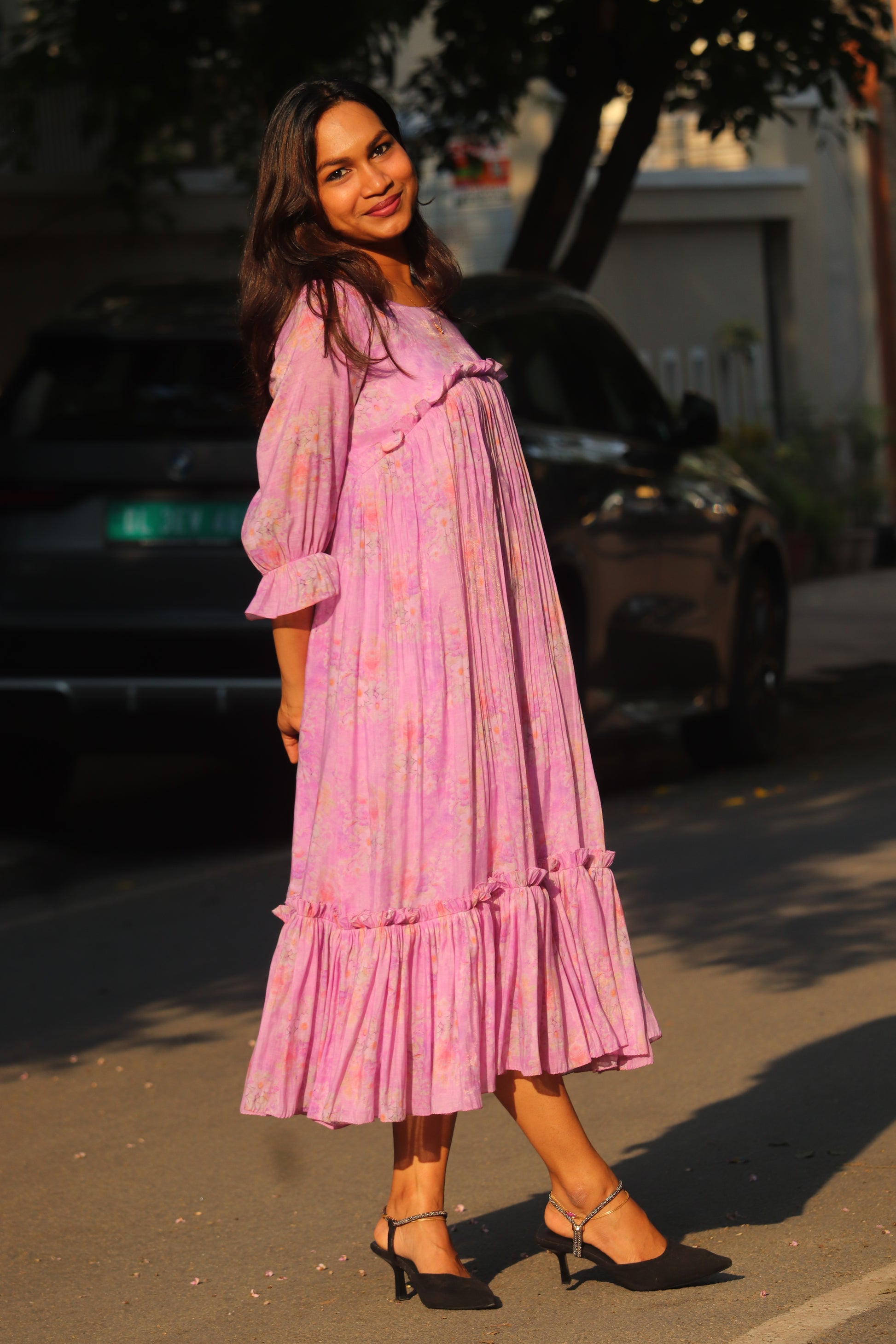 Side view of lavender floral chanderi tier dress with gathered layers