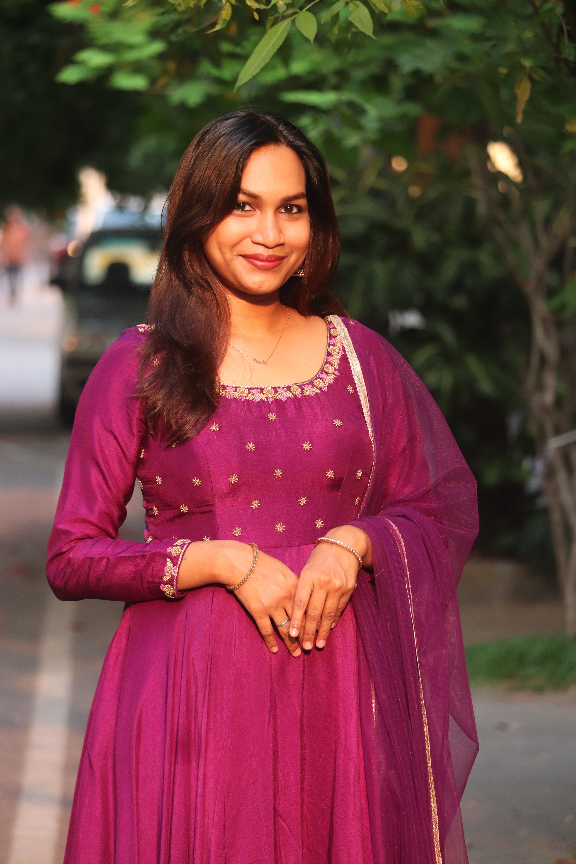 Front view of Ziyana purple umbrella Anarkali with handcrafted yoke detailing