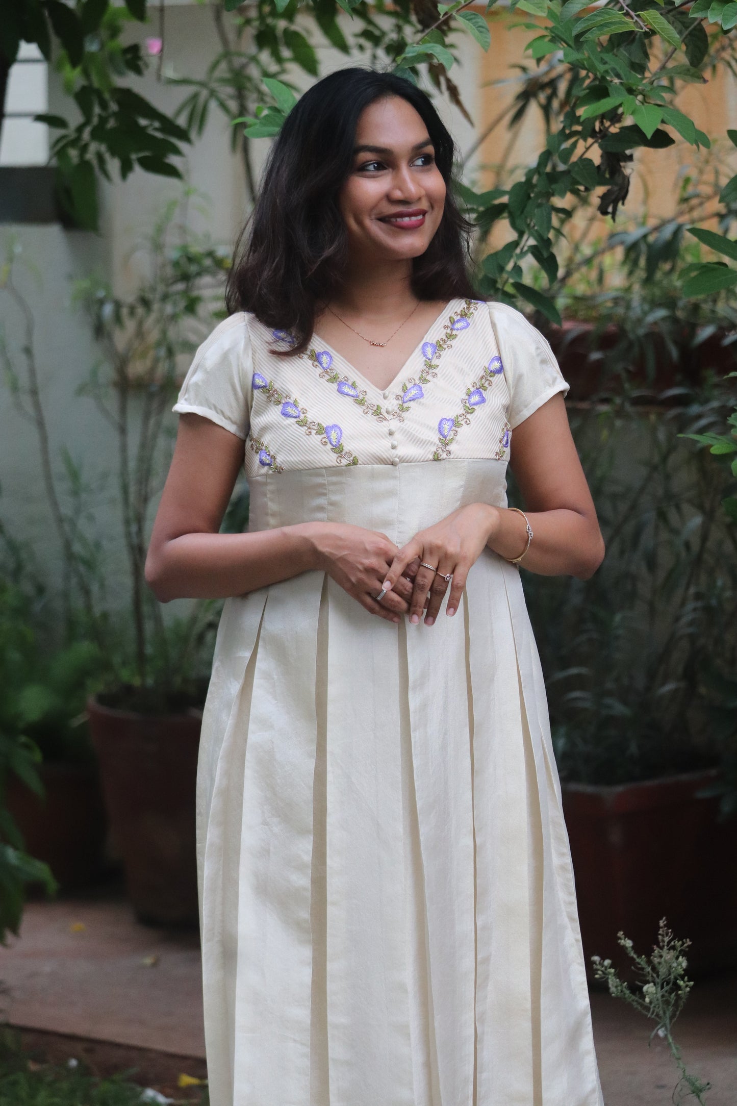 Shankupushpam - Floral embroidered box pleated dress