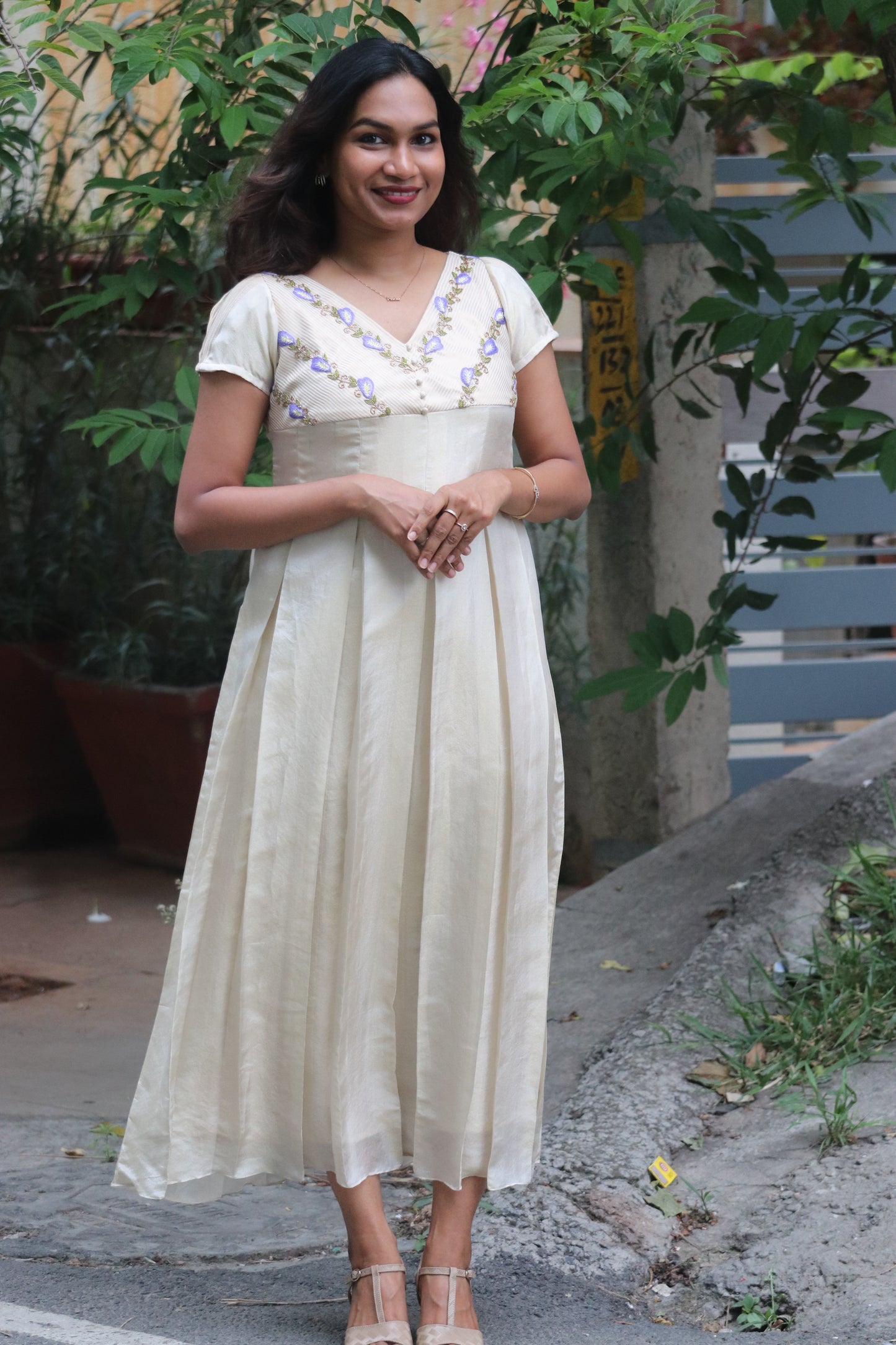 Shankupushpam - Floral embroidered box pleated dress