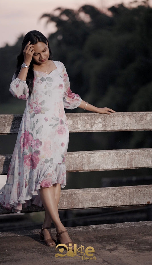 Blushbloom light blue with pink floral prints aline frock with high low pattern with floral print - front view