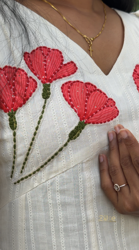 Blossom in off white showing panel cut aline kurti and design