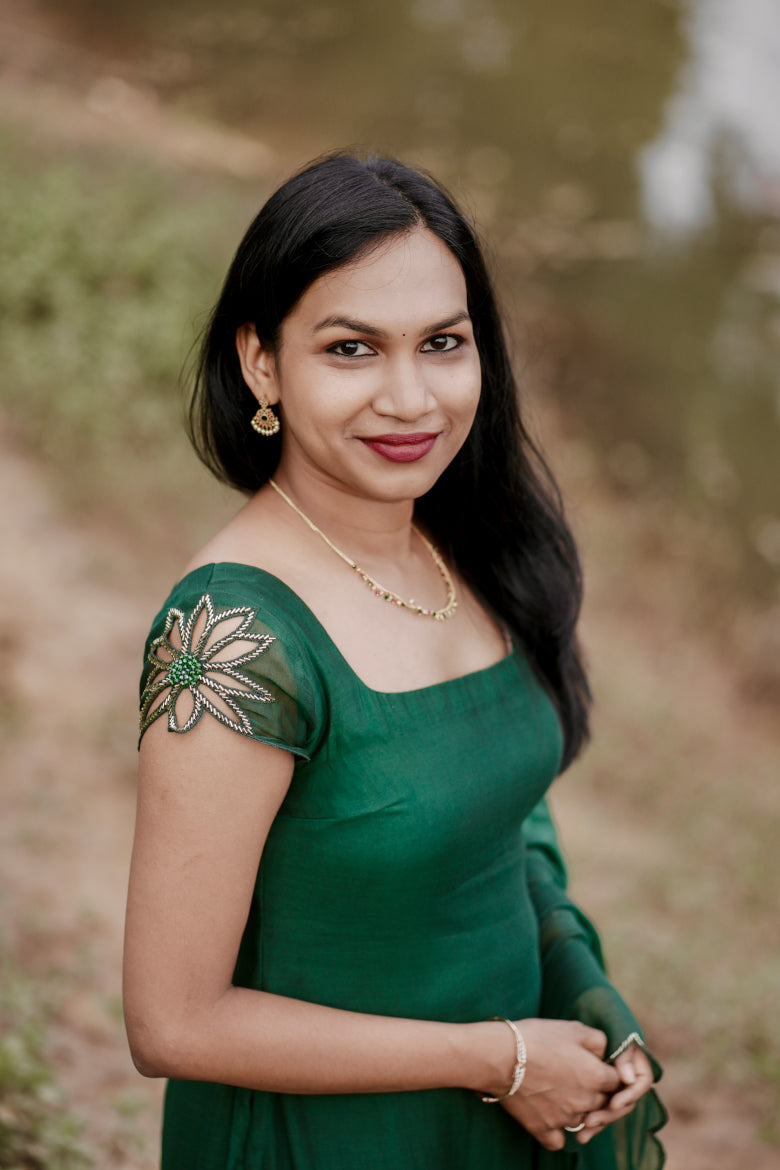 Signature Pair Emerald and Noir Mul Chanderi salwar sets in bottle green and black - front view