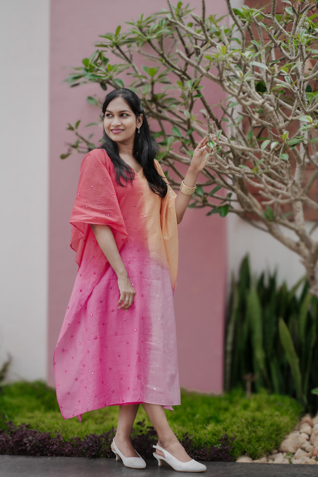Aarza chanderi multicolor kaftan with mirror work and curved V neck in peach and pink hues