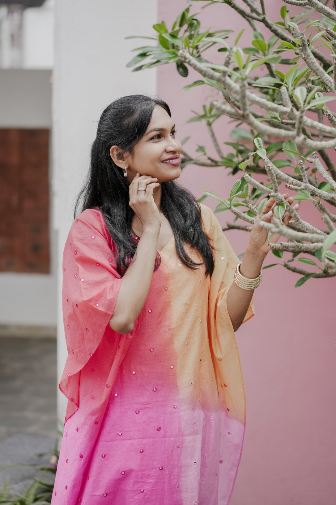 Aarza chanderi multicolor kaftan with mirror work and curved V neck in peach and pink hues