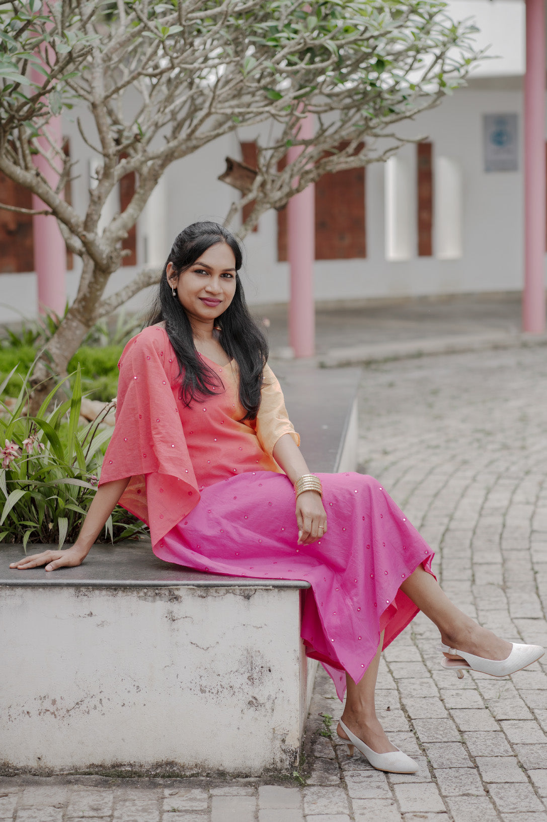 Aarza chanderi multicolor kaftan with mirror work and curved V neck in peach and pink hues