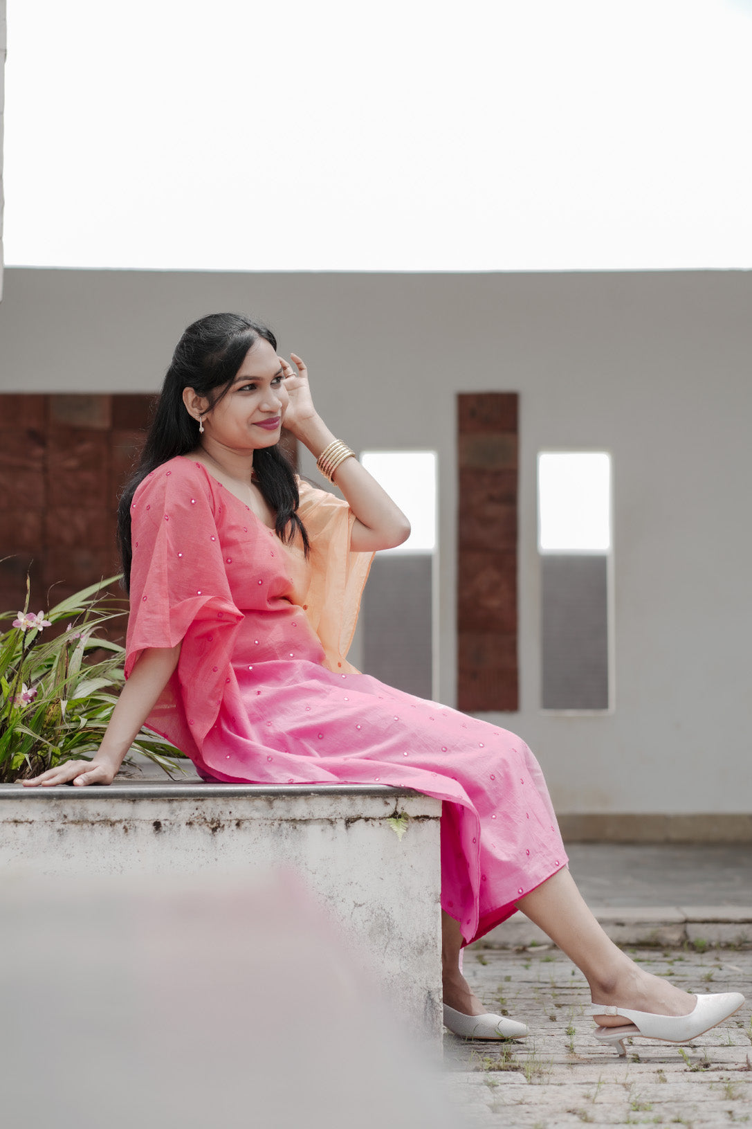 Aarza chanderi multicolor kaftan with mirror work and curved V neck in peach and pink hues