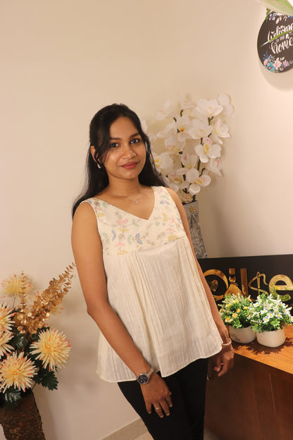 Ivoree off-white cotton short top with pastel color embroidered yoke and v neck