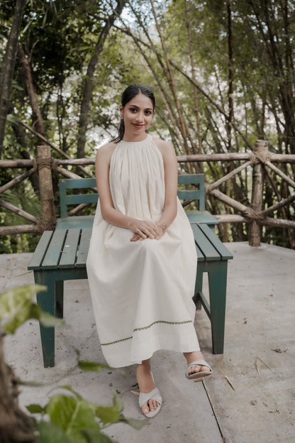Selin in off white showing gathered aline dress and design