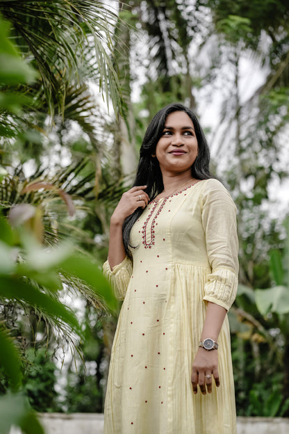 Sunhera full-length styled view in light yellow